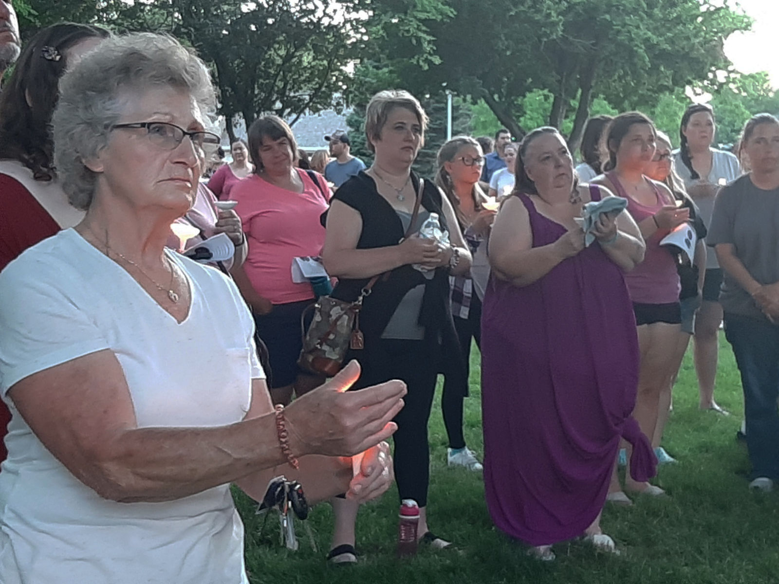 People at candlelight vigil